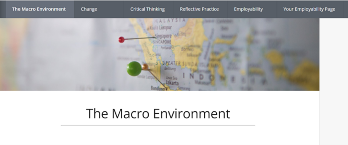 A PebblePad workbook, titled The Macro Environment. A picture in the banner shows a map with pins placed in it. Above the top of the workbook are tabs users can select. 